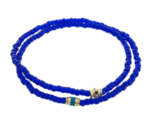 LUIS MORAIS double-wrap beaded bracelet features a 14k yellow gold barrel with blue sapphires and an enameled gold barrel.