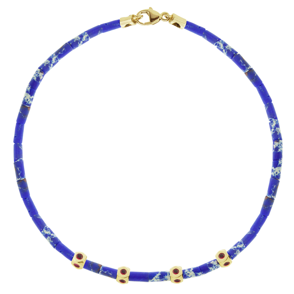 <p>LUIS MORAIS four mini Tetras with four sides of blue sapphires on a gemstone tube beaded bracelet with a 14k yellow gold clasp.</p> <ul> <li></li> </ul>