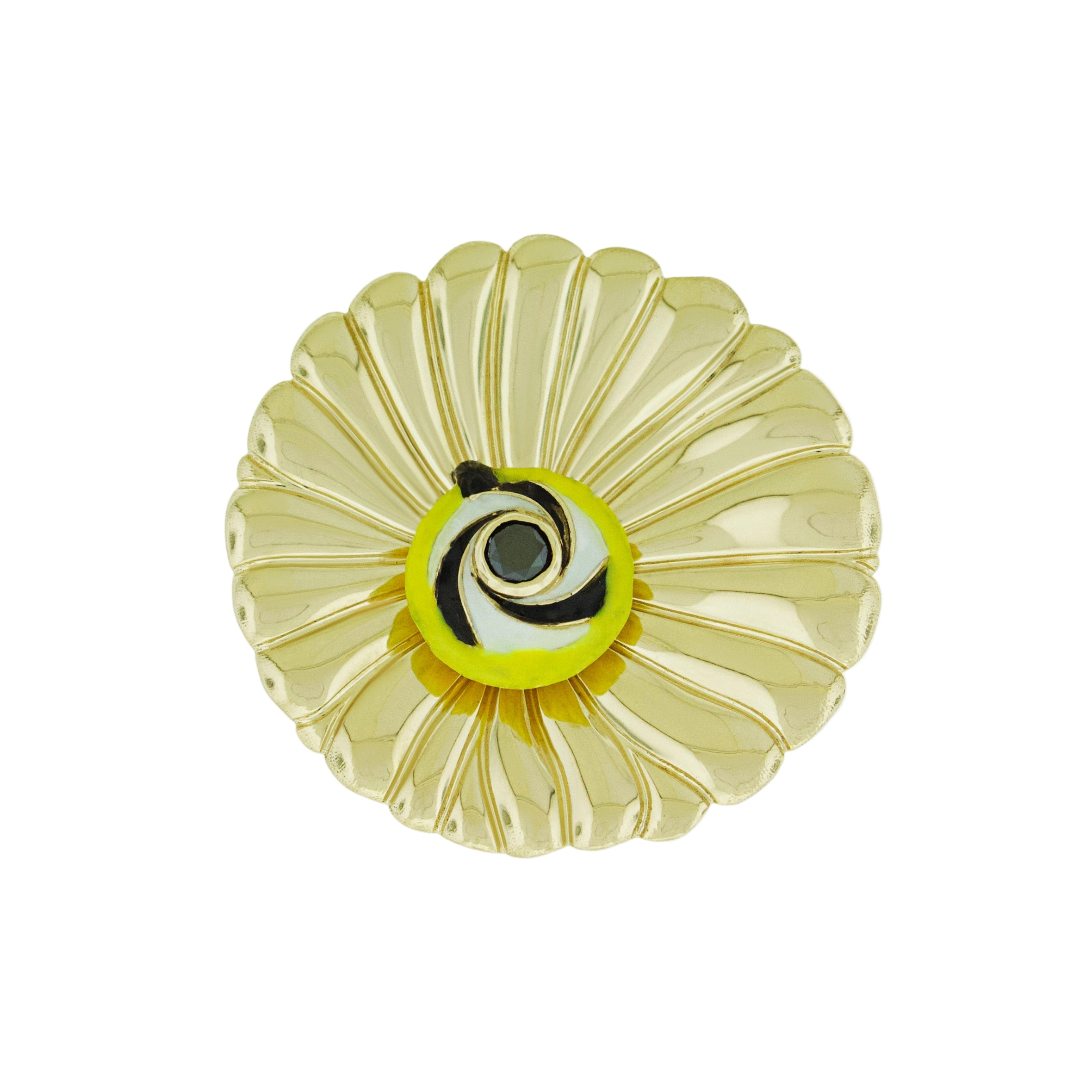 Decorative brooch with a yellow and black design on a white background