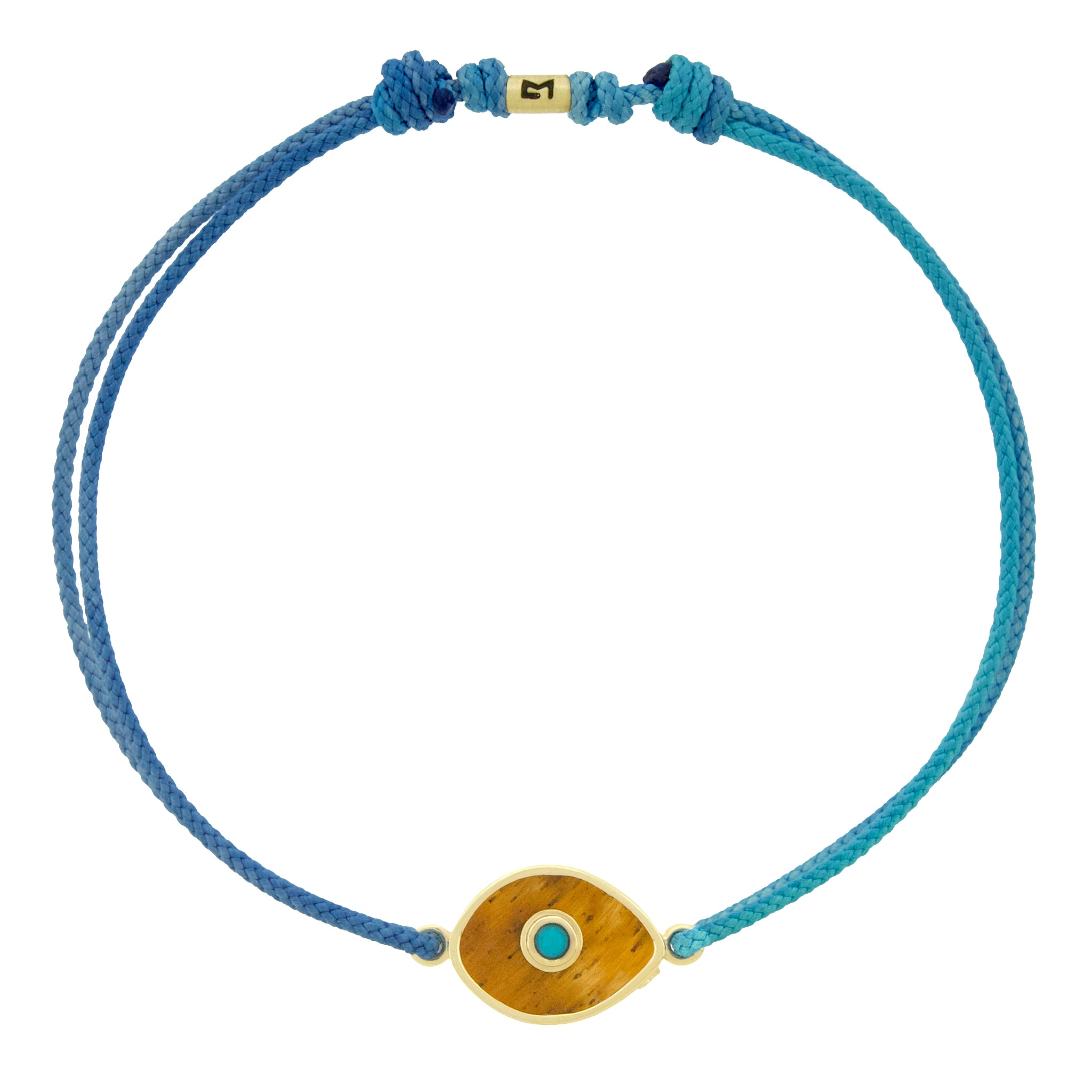 LUIS MORAIS 14k yellow gold framed gemstone eye with a turquoise cabochon center on an adjustable cord bracelet.