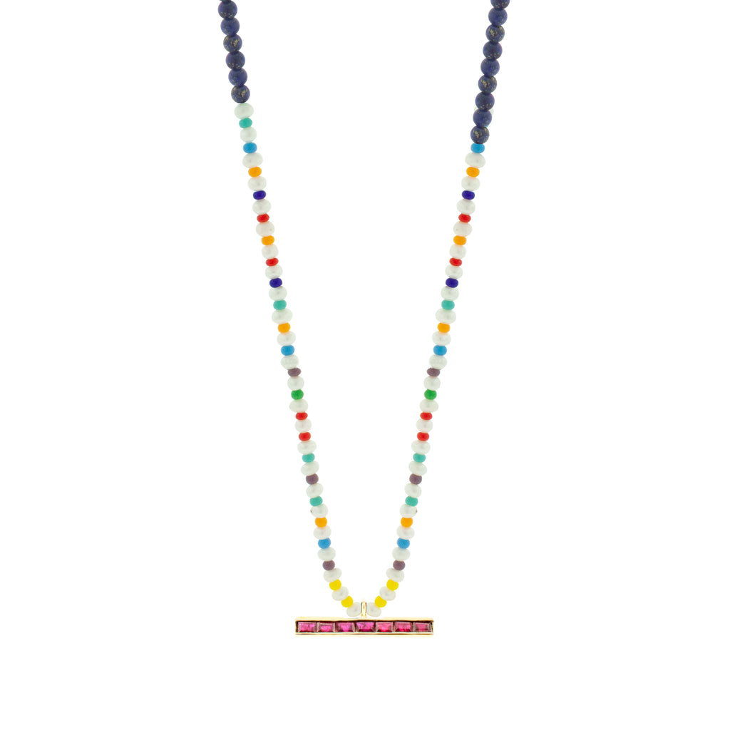 LUIS MORAIS 14k yellow gold medium link ID bar with ruby baguettes on a pearl, Lapis, and glass beaded necklace. Lobster clasp closure.  Main gemstone: Lapis 