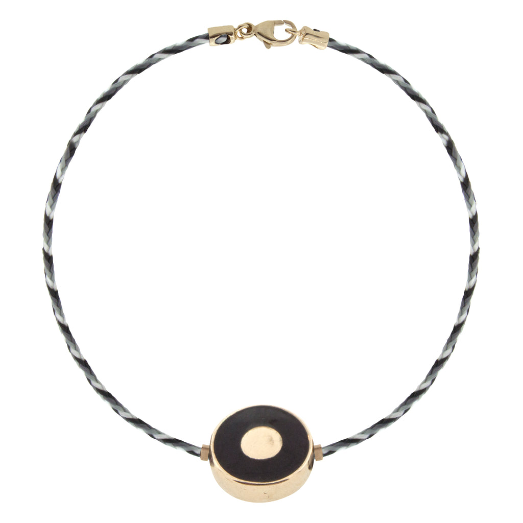 LUIS MORAIS 14K yellow gold large disk with a recessed enameled evil eye disk on a cord bracelet with a lobster clasp closure.