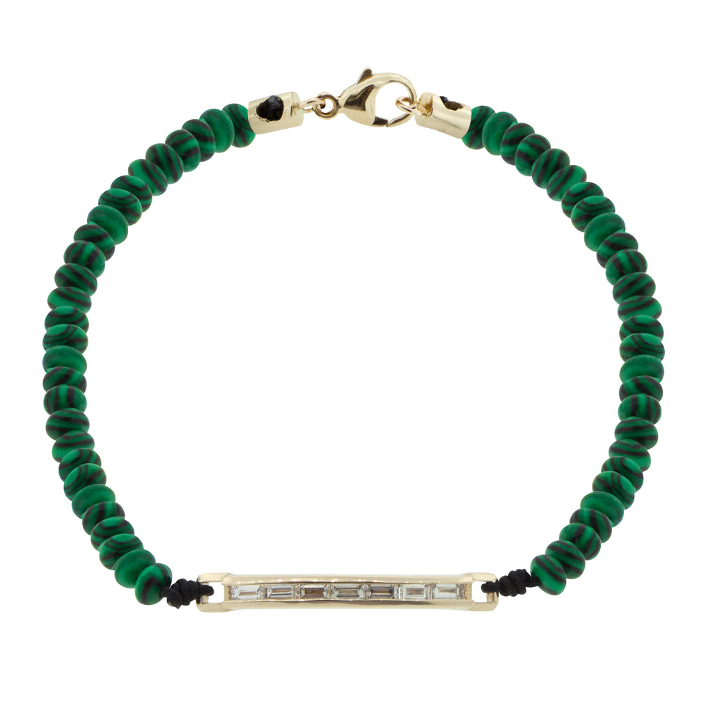 LUIS MORAIS 14K gold medium link ID bar with white diamond baguettes on a malachite gemstone beaded bracelet with 14k yellow gold lobster clasp closure.
