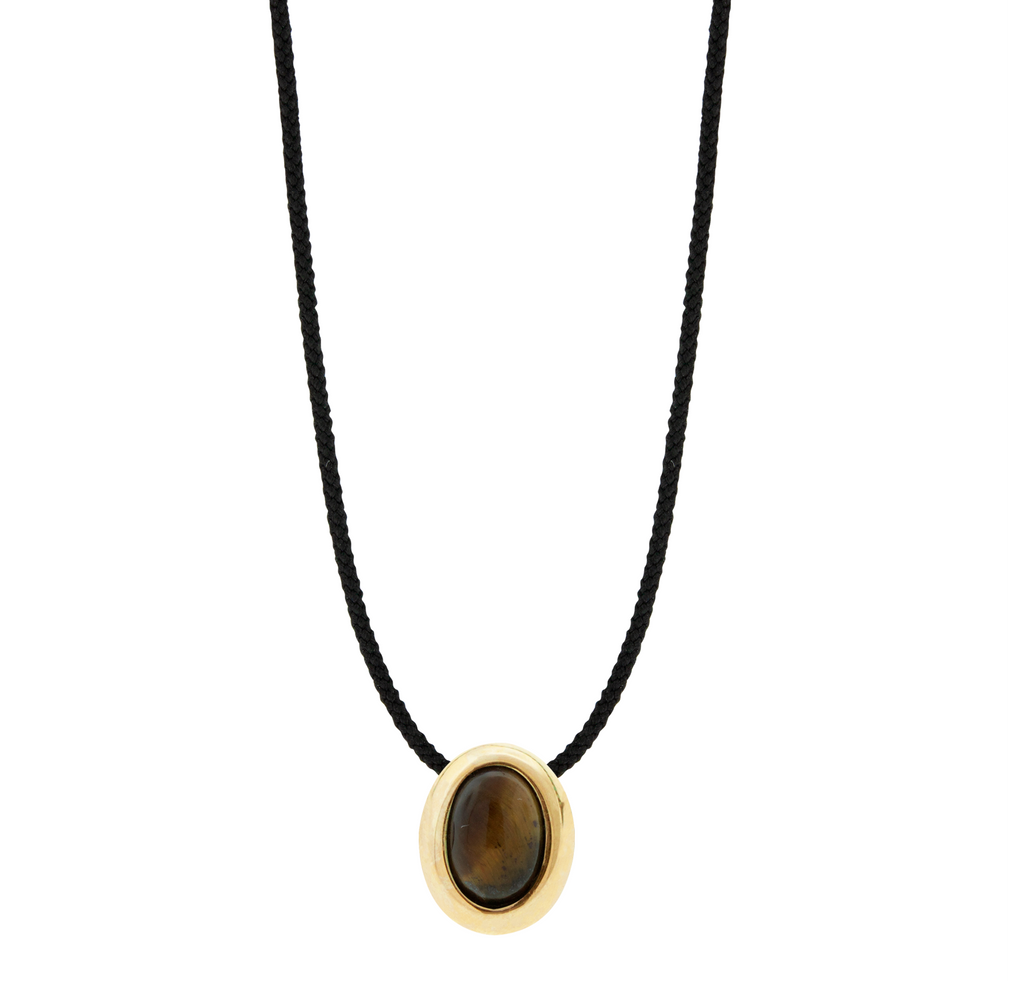 LUIS MORAIS 14k yellow gold oval <em>Eye of the Idol</em> cabochon bead with a Tiger's Eye gemstone center on an adjustable cord necklace.&nbsp;