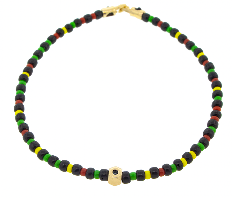 LUIS MORIAS 14K yellow golf tetra bead with a black diamond on a  glass beaded bracelet with hook clasp closure.