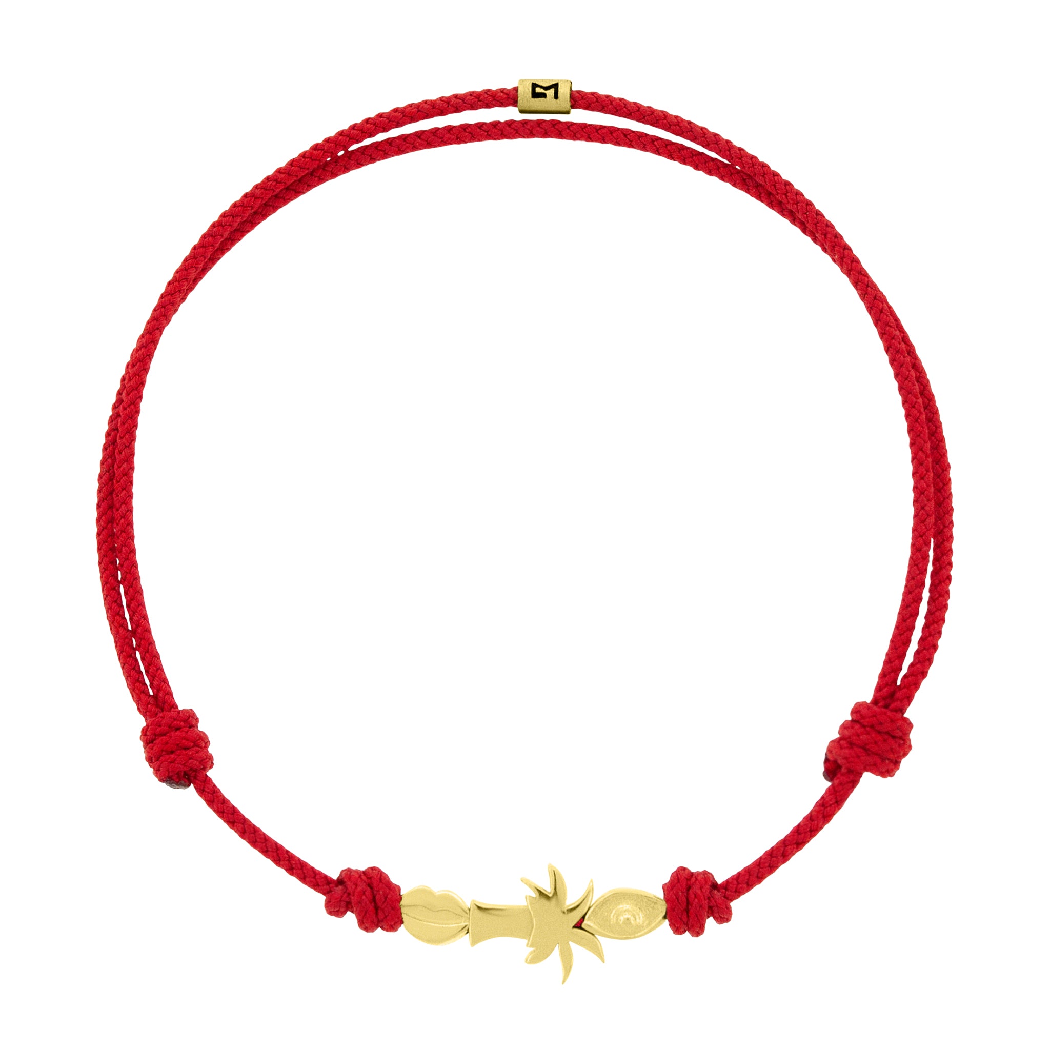 Red cord bracelet with a gold fish charm on a white background