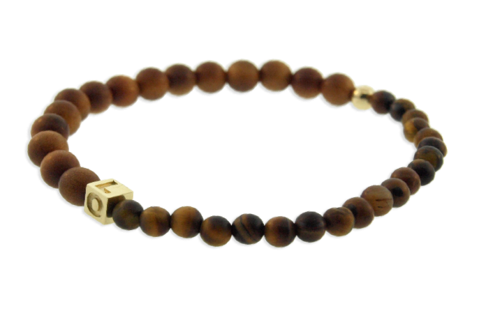 LUIS MORAIS 14k yellow gold cube with engraved LOVE and gold ball on a sandalwood beaded bracelet.  