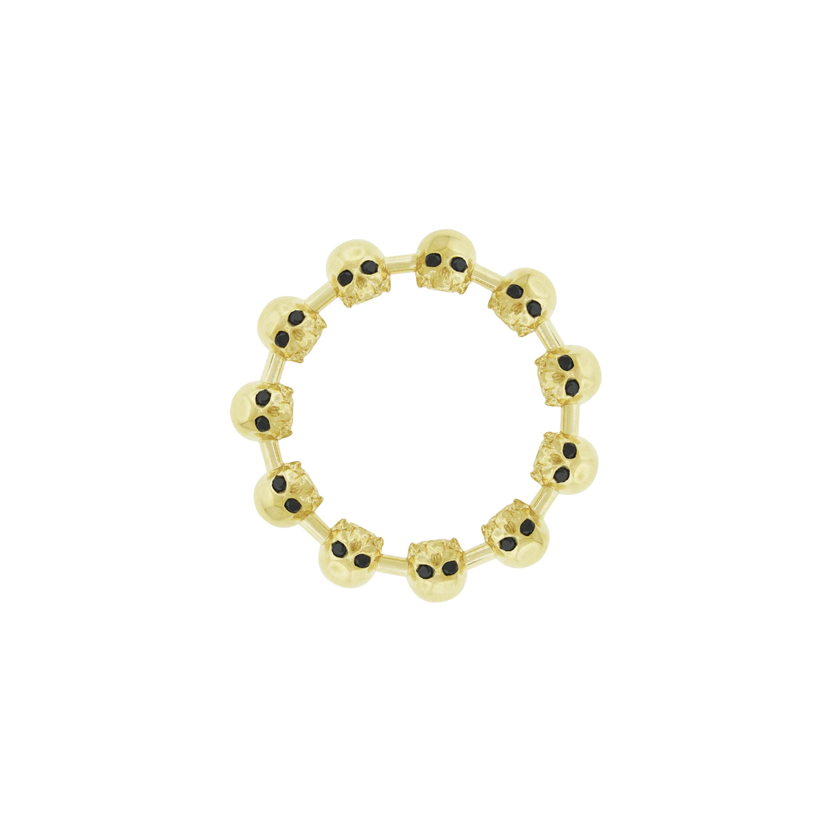 LUIS MORAIS 14k yellow gold half-skull ring features white diamonds at their crown and black diamond eyes. The skull is a powerful symbol, often representing the transient nature of life and the inevitability of mortality. It serves as a reminder of our mortality and the importance of living authentically.