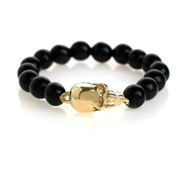 LARGE GOLD SKULL BRACELET ON EBONY BEADS