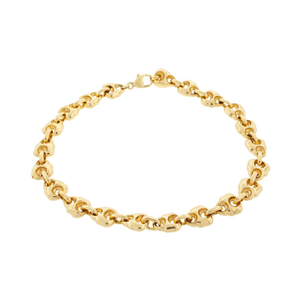 LUIS MORAIS 14K yellow gold skull face chain bracelet with lobster clasp closure.