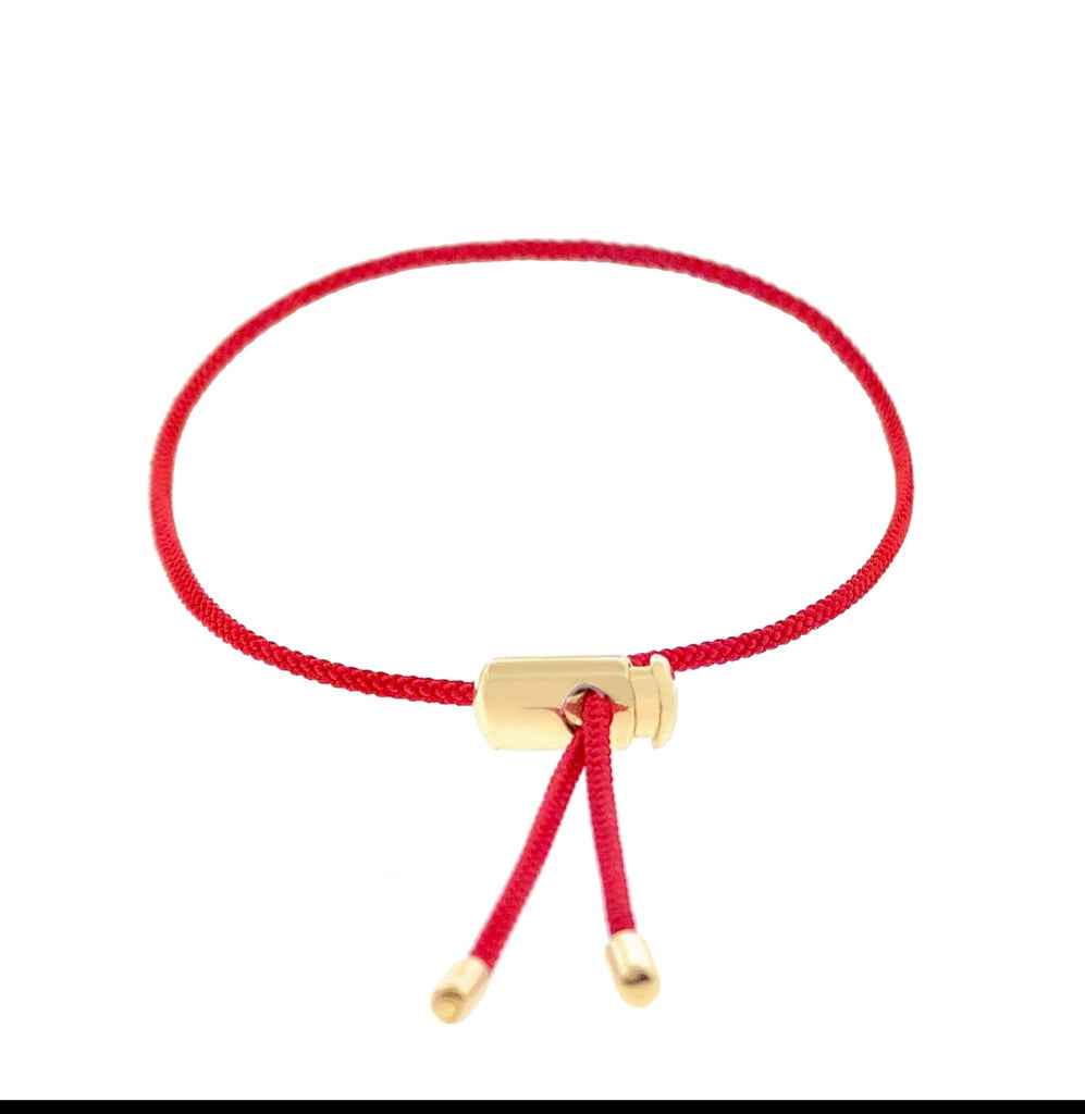 LUIS MORAIS 14K yellow gold push cord bracelet with bullet tip ends. Adjustable.