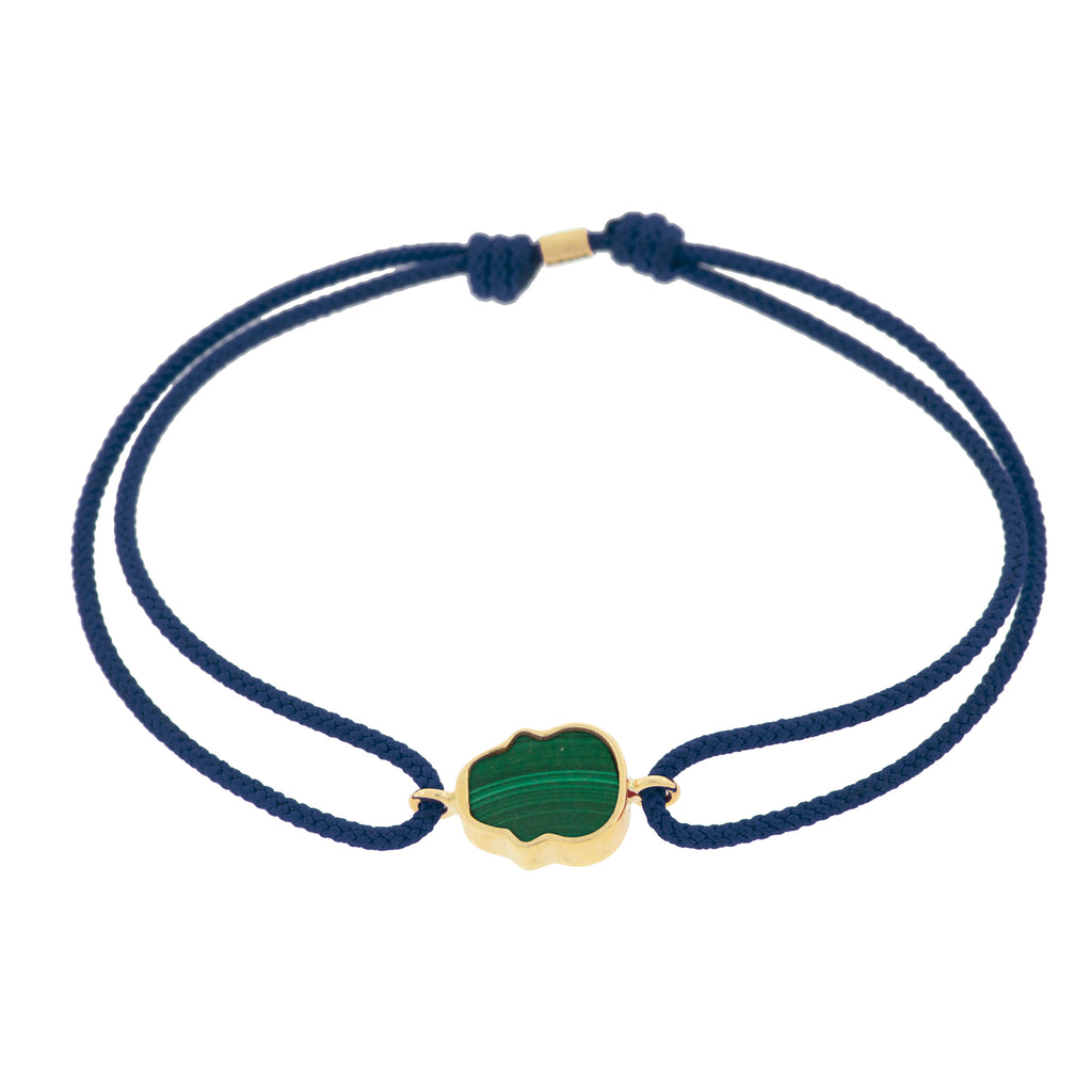 LUIS MORAIS 14K yellow gold 'The Good Times' small skull face medallion with a malachite gemstone backing on a navy cord bracelet BACK PHOTO