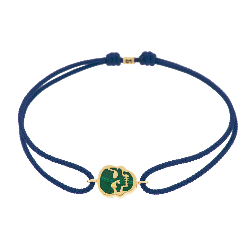 LUIS MORAIS 14K yellow gold 'The Good Times' small skull face medallion with a malachite gemstone backing on a navy cord bracelet