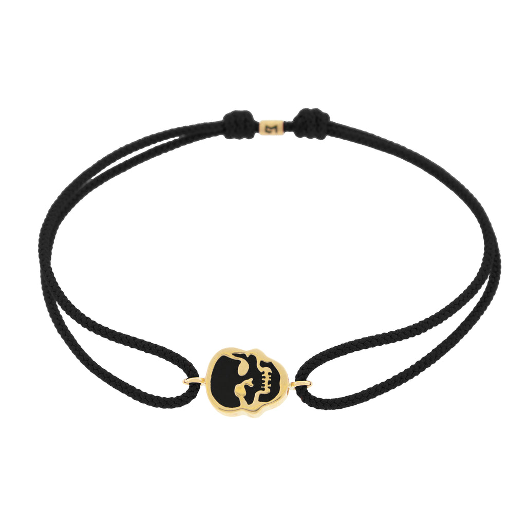 LUIS MORAIS 14K yellow gold 'The Good Times' small skull face medallion with an onyx gemstone backing on a black cord bracelet