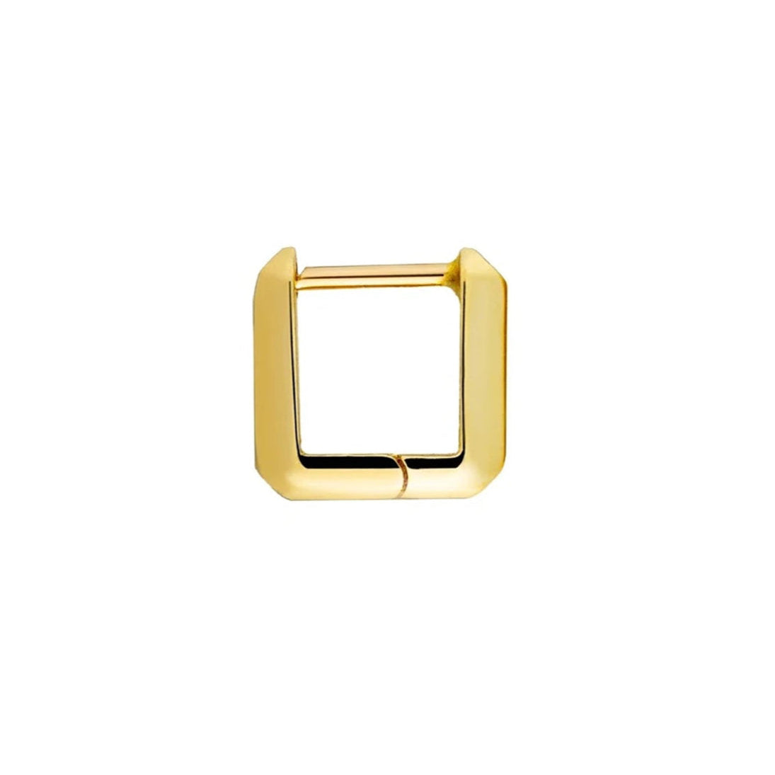A single small gold link huggie earring against a white background
