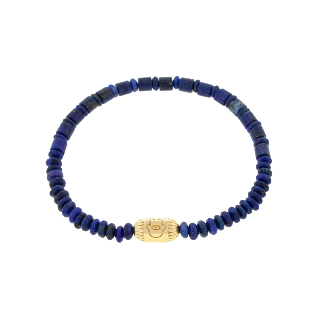 LUIS MORAIS 14K yellow gold ribbed hexagon bolt bead with a hamsa protection symbol on a lapis beaded bracelet