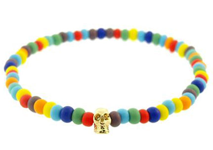 LUIS MORAIS 14k yellow gold mini skull on a glass beaded bracelet. Elasticized stretch cord.