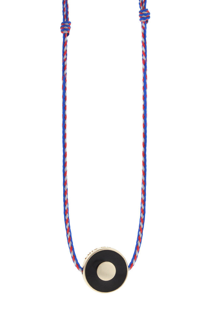 LUIS MORAIS 14K yellow gold enameled large disk with a recessed evil eye on an adjustable cord necklace.