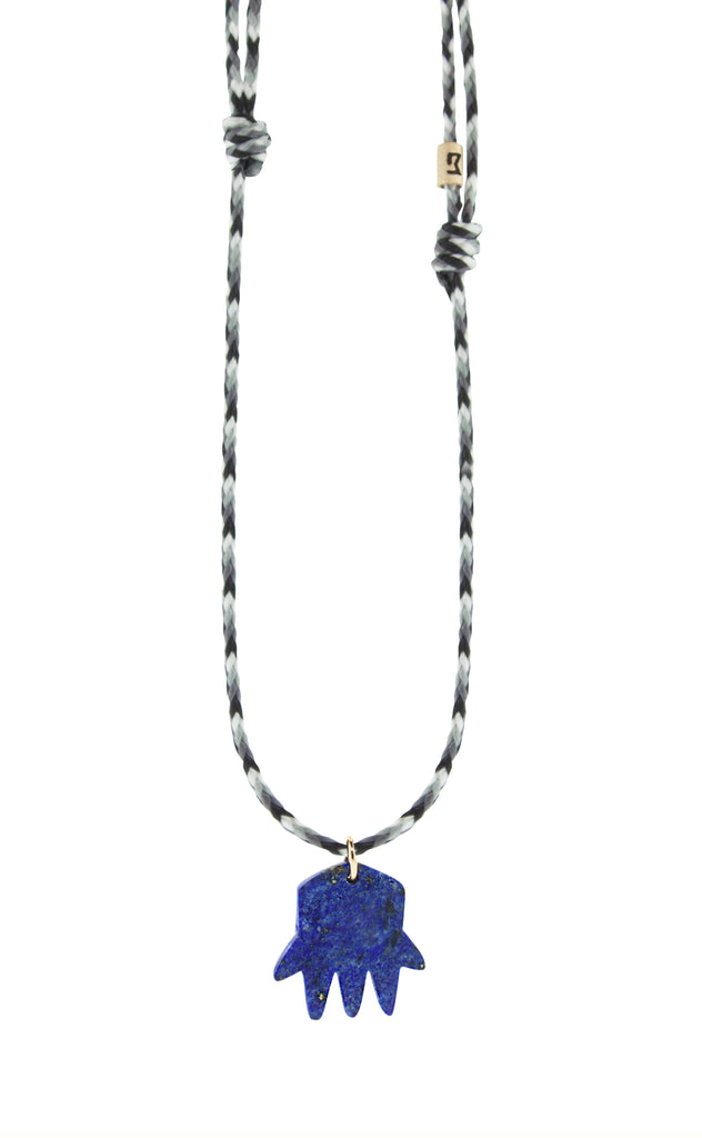 LUIS MORAIS Lapis Gemstone Hand Pendant with a 14k yellow gold bail and logo spacer on an adjustable cord necklace.