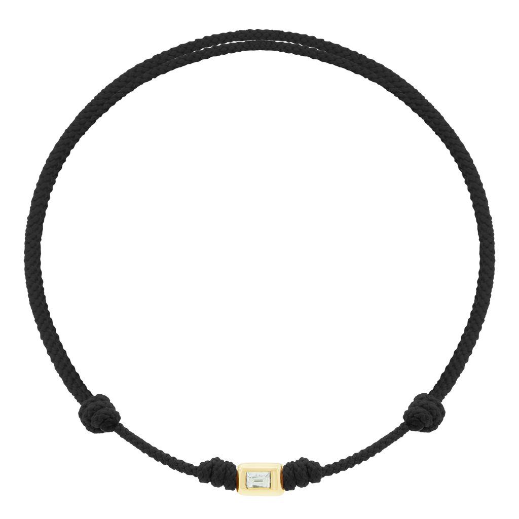 <div> <p data-mce-fragment="1">LUIS MORAIS 14k yellow gold small ingot with a white diamond baguette on an adjustable cord bracelet.</p> </div> <ul> <li></li> </ul>