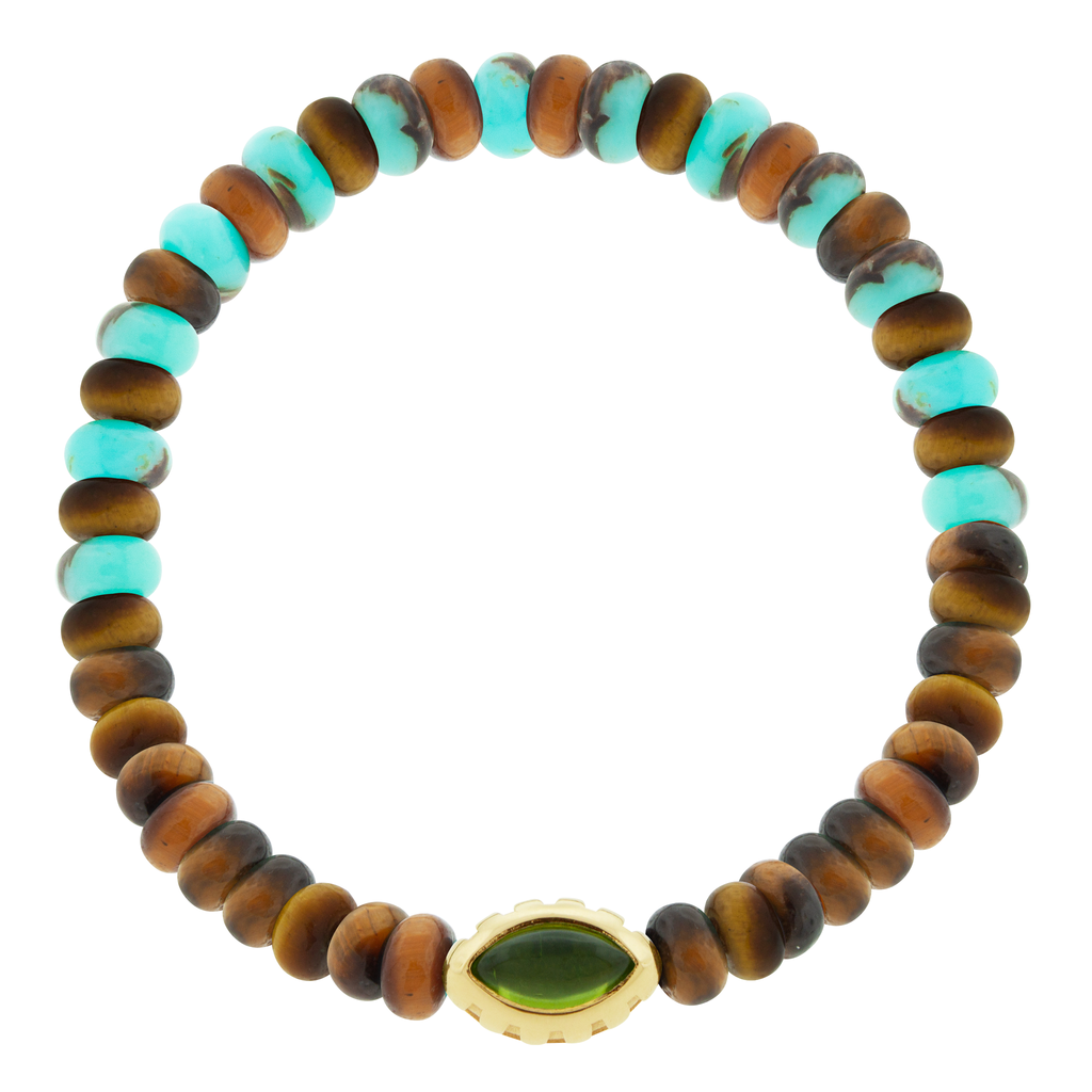 LUIS MORAIS 14k yellow gold Eye of the Idol bead with a marquise Peridot gemstone on a Turquoise and Tiger's Eye beaded bracelet.
