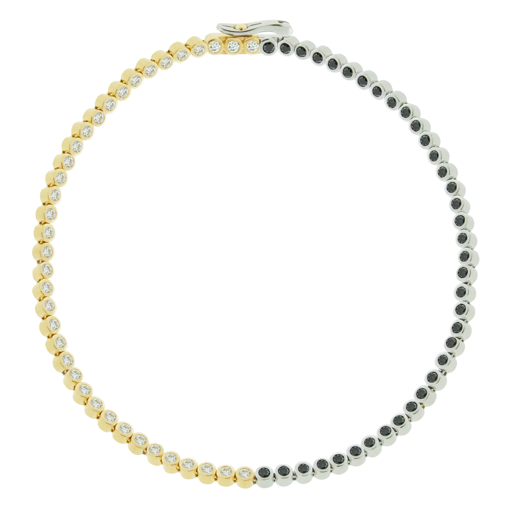 LUIS MORAIS 14K yellow gold and white gold tennis bracelet with half white diamonds and half black diamonds.&nbsp;