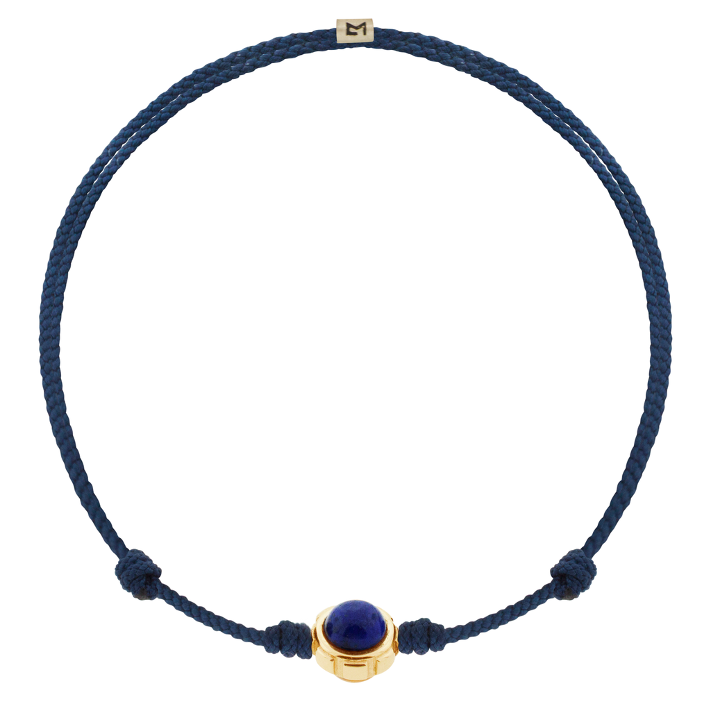 LUIS MORAIS 14k yellow gold rotary collar with Lapis and Tiger's Eye cabochon gemstones on an adjustable cord bracelet. Features a 14k yellow gold logo spacer.  *If you require a size that is not available in the options provided, please indicate your preferred size in the designated text box during checkout.