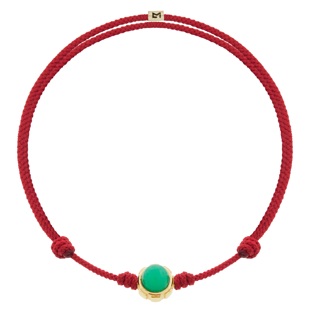 LUIS MORAIS 14k yellow gold rotary collar with Onyx and Chrysoprase cabochon gemstones on an adjustable cord bracelet. Features a 14k yellow gold logo spacer.  *If you require a size that is not available in the options provided, please indicate your preferred size in the designated text box during checkout.