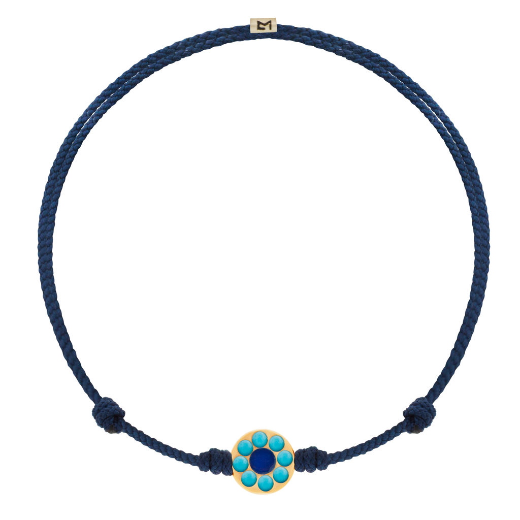 LUIS MORAIS 14k yellow gold small Evil Eye disk surrounded by eight Turquoise stones with an enameled center on an adjustable cord bracelet. Features a 14k yellow gold logo spacer.  *If you require a size that is not available in the options provided, please indicate your preferred size in the designated text box during checkout.