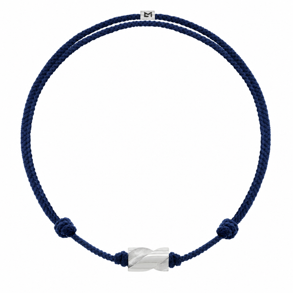 Long White Gold Drill Bit on Navy Cord Bracelet