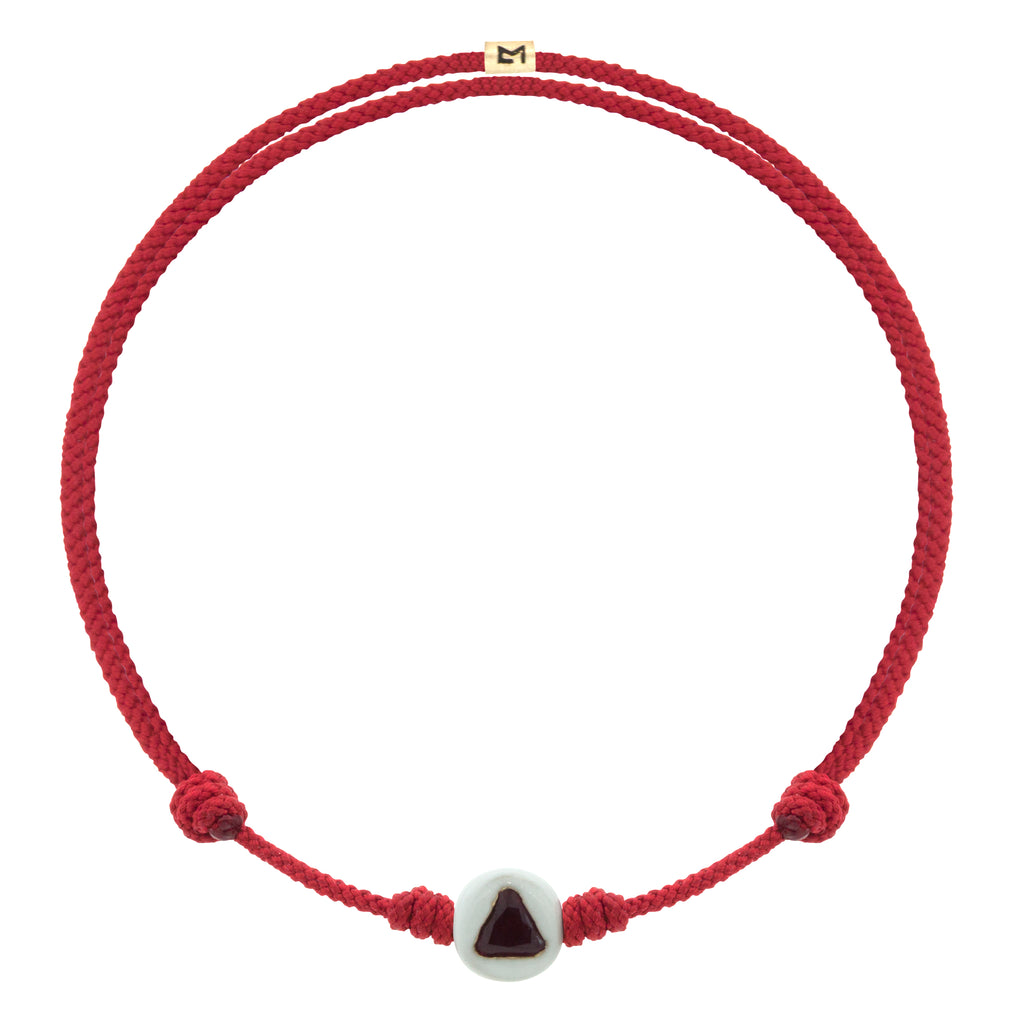 White Enameled Large Gold Ball With Ruby Trillion Cord Bracelet