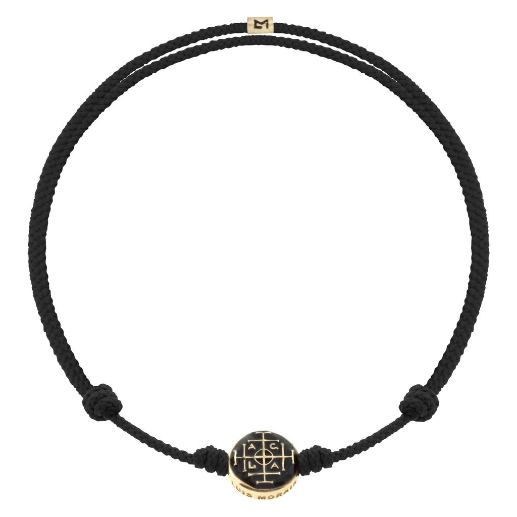 LUIS MORAIS 14K yellow gold small disk with an enameled Money Seal symbol disk on an adjustable cord bracelet.  