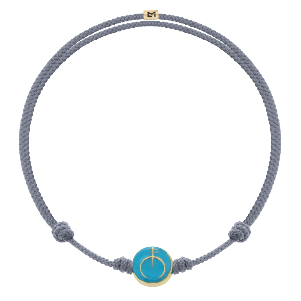 LUIS MORAIS 14K yellow gold small disk with an enameled Naja symbol disk on an adjustable cord bracelet.  