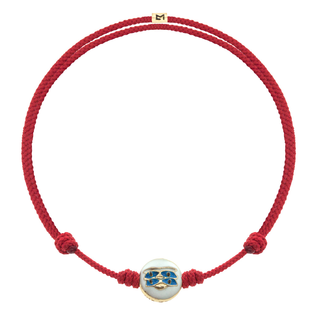 LUIS MORAIS 14K yellow gold small disk with a blue enameled Horus Eyes symbol disk on an adjustable cord bracelet. Features a 14k gold logo spacer.