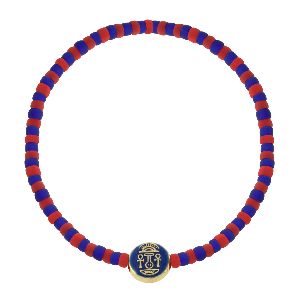 LUIS MORAIS 14K yellow gold small disk with enameled Good Luck symbol on a glass beaded bracelet. 