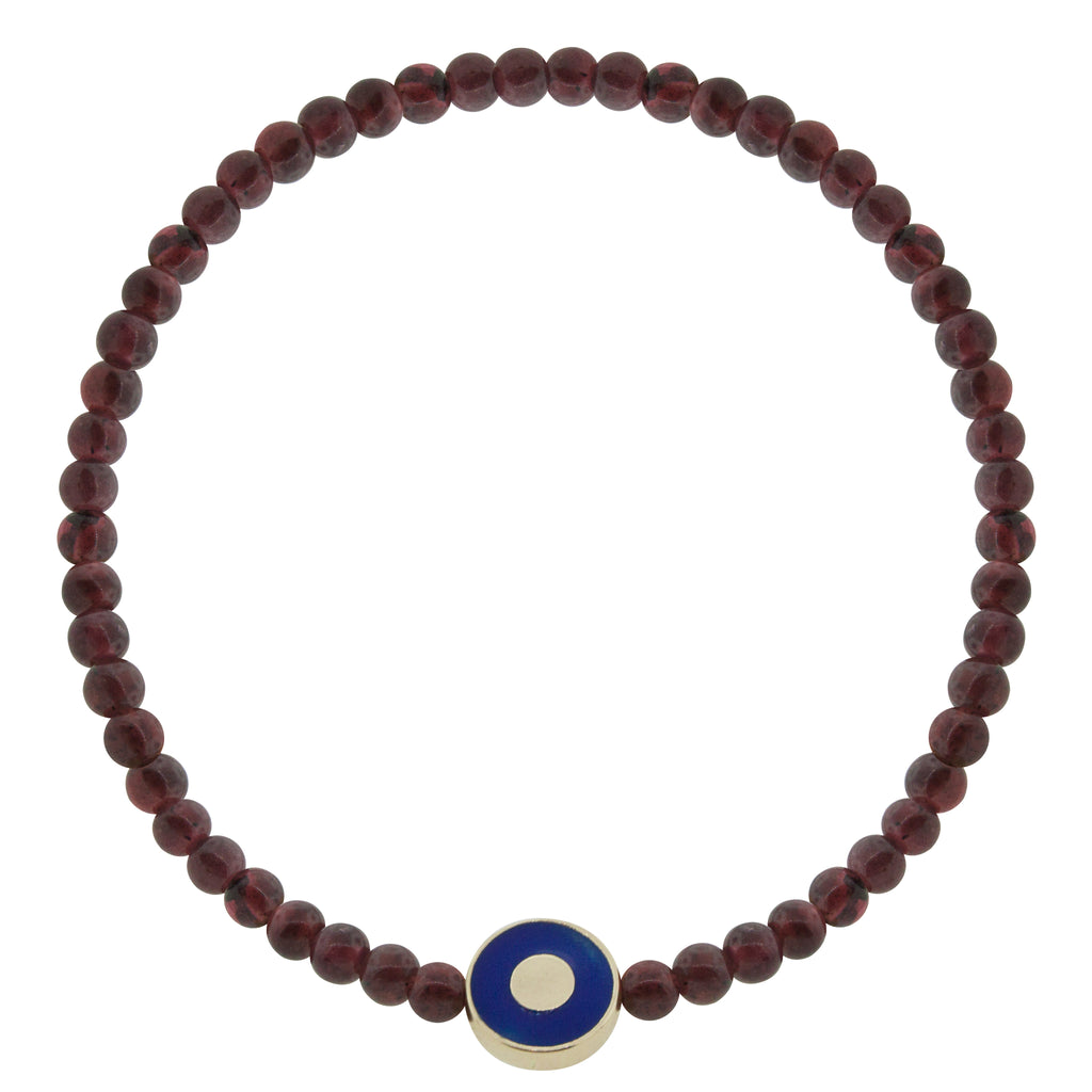 LUIS MORAIS 14K yellow gold small disk with a recessed a blue enameled evil eye on a garnet gemstone beaded bracelet.