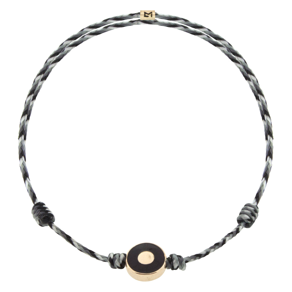 LUIS MORAIS 14K yellow gold small disk with a recessed enameled evil eye disk on an adjustable cord bracelet.     