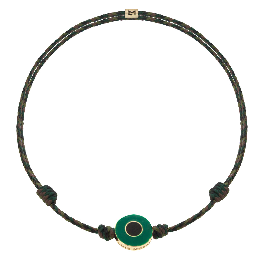 LUIS MORAIS 14K yellow gold small disk with a recessed double-enameled evil eye disk on an adjustable cord bracelet.  