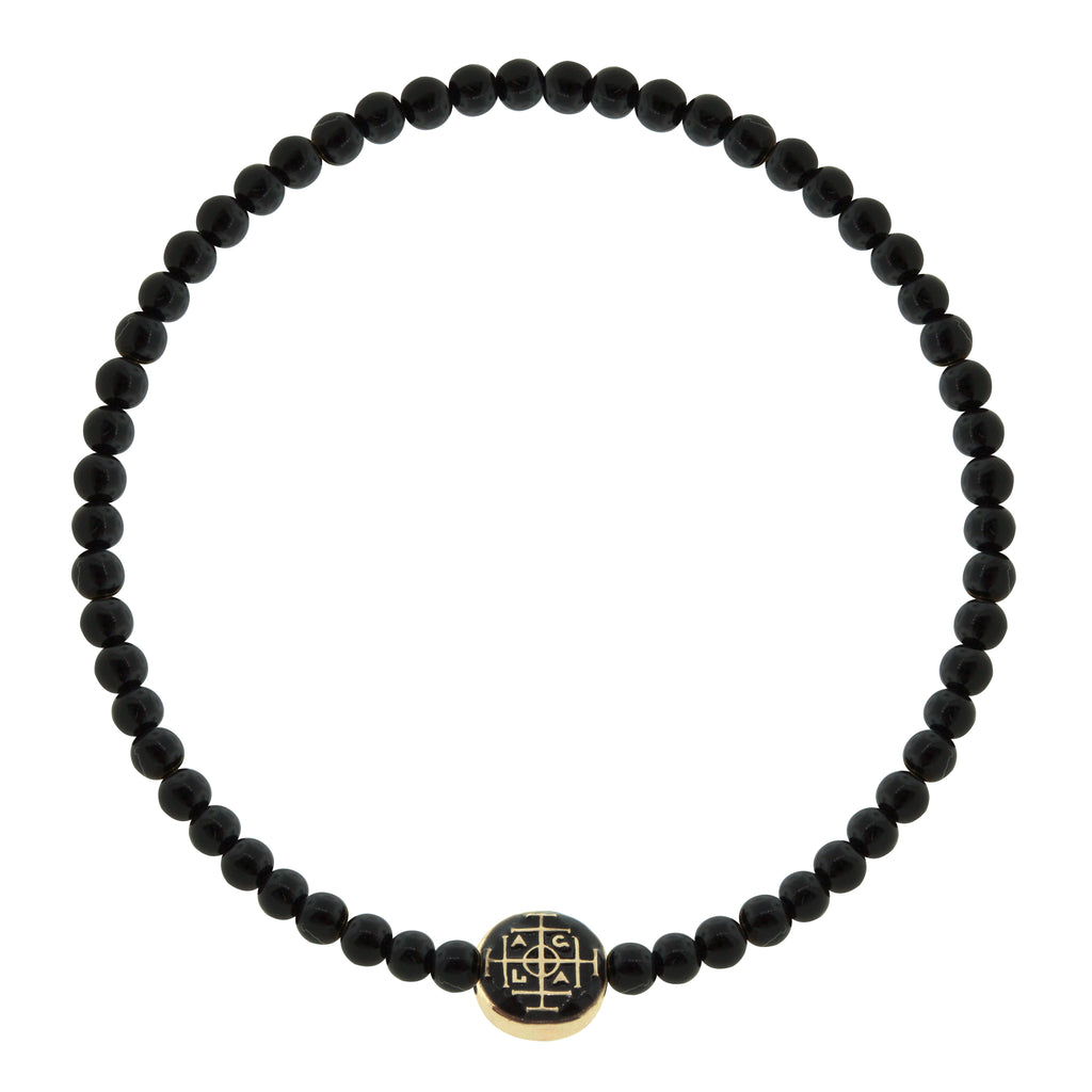 LUIS MORAIS 14K yellow gold small disk with enameled symbol on a round onyx gemstone beaded bracelet. 