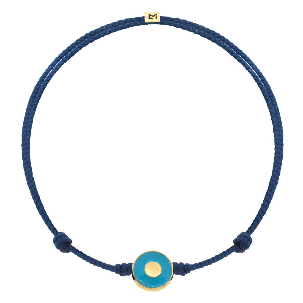 LUIS MORAIS 14K yellow gold small disk with a turquoise enameled Evil Eye symbol on an adjustable cord bracelet. Features a 14K gold logo spacer.