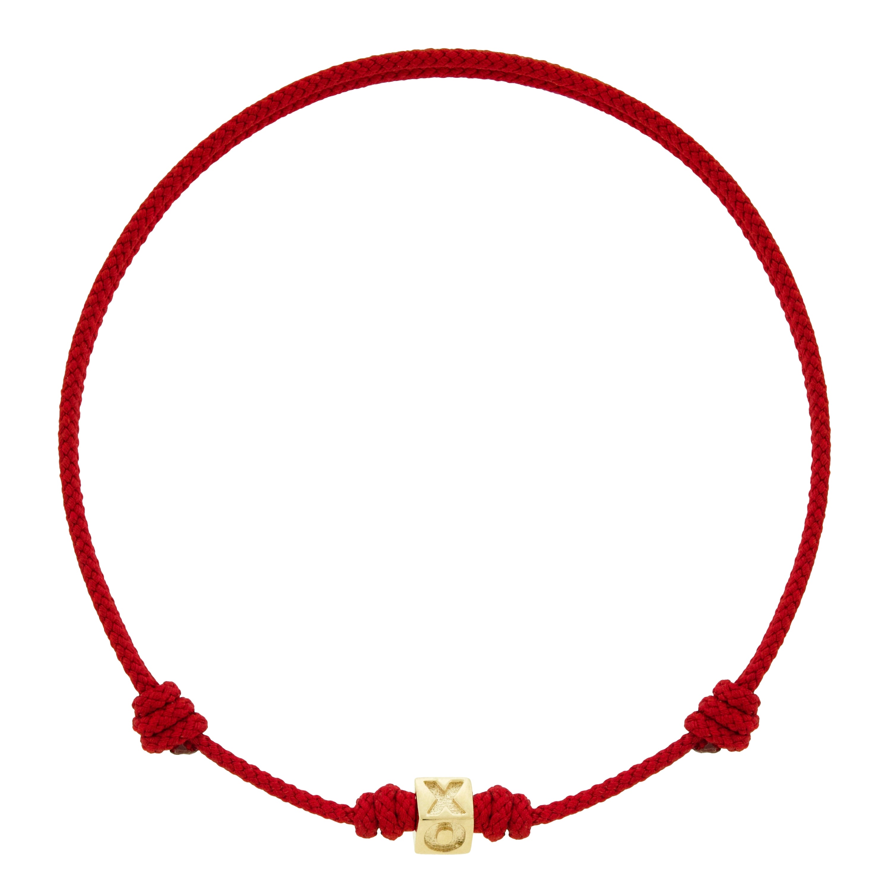 Red cord bracelet with a gold charm on a white background