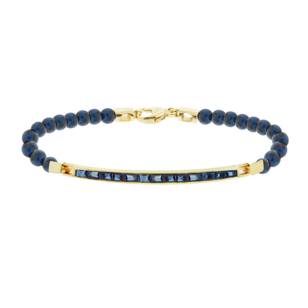 LUIS MORAIS 14K gold large link ID bar with blue sapphire baguettes on a lapis gemstone beaded bracelet. 14k yellow gold lobster clasp closure.     *If you require a size that is not available in the options provided, please indicate your preferred size in the designated text box during checkout.