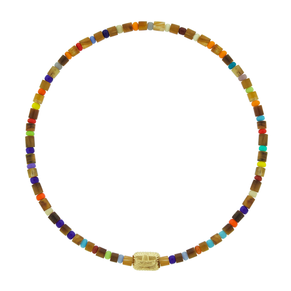 LUIS MORAIS 14k yellow gold small corrugated ingot with sombrero symbol on a gemstone and glass beaded bracelet. A light-hearted twist on our symbol designs.