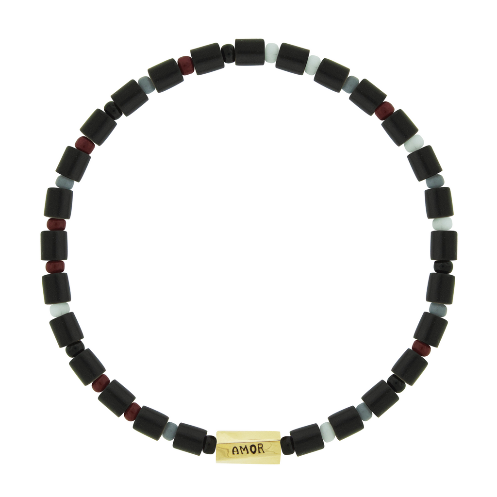 LUIS MORAIS 14k yellow gold large twisted hexagon with navy enameled words on a gemstone and glass beaded bracelet. Engraved with the word "fidem" which means faith in Latin.