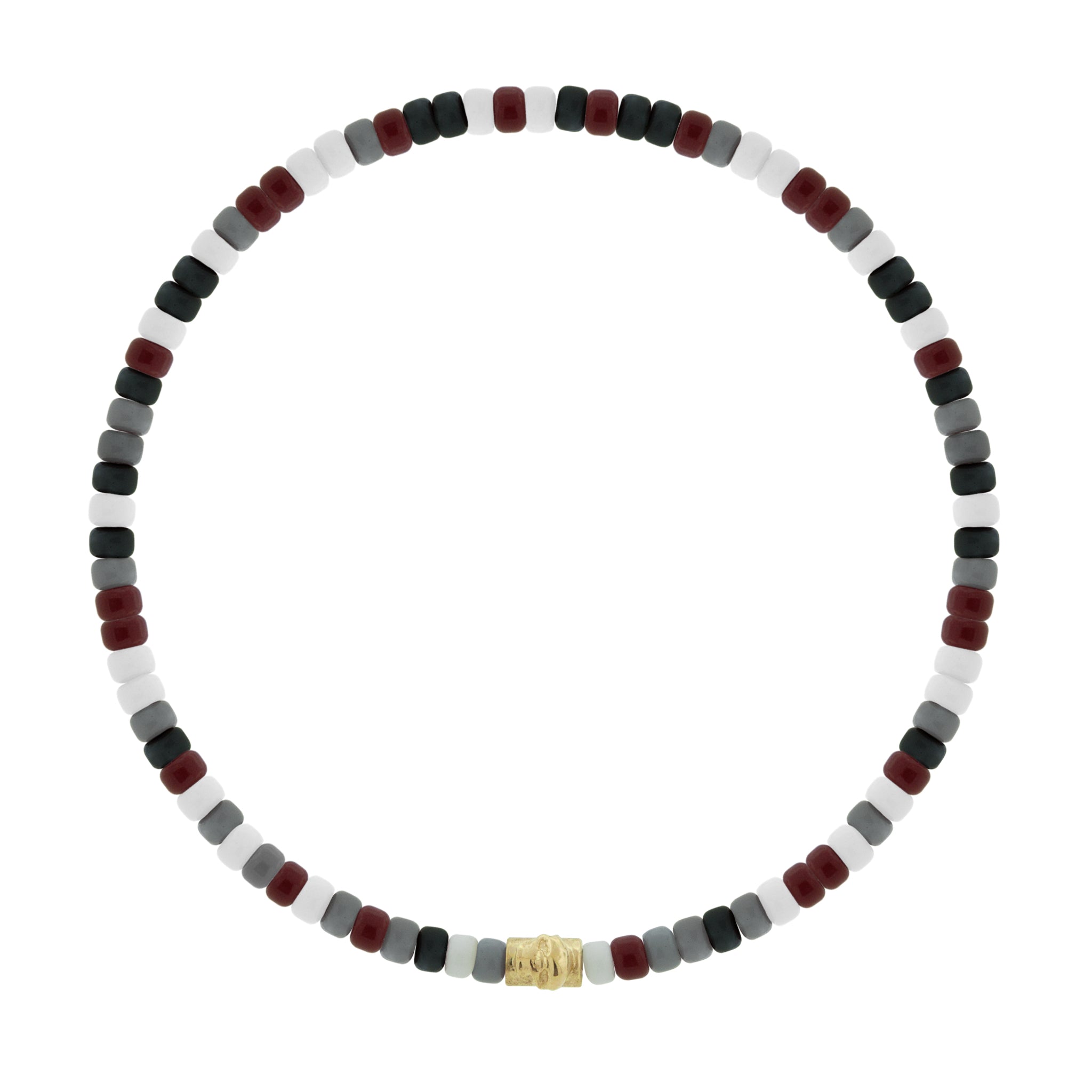 LUIS MORAIS 14k yellow gold single spacer bead with a skull symbol on a glass beaded bracelet.