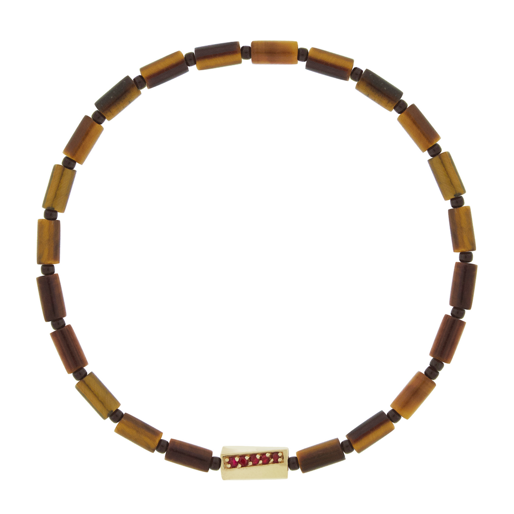 LUIS MORAIS 14k yellow gold twisted hexagon with three channels of rubies on a gemstone and glass beaded bracelet.