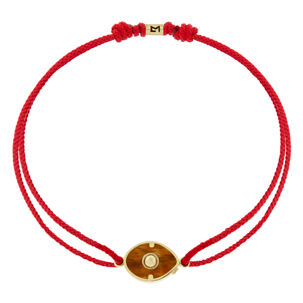 LUIS MORAIS 14k yellow gold framed gemstone eye on a cord bracelet. Adjustable.