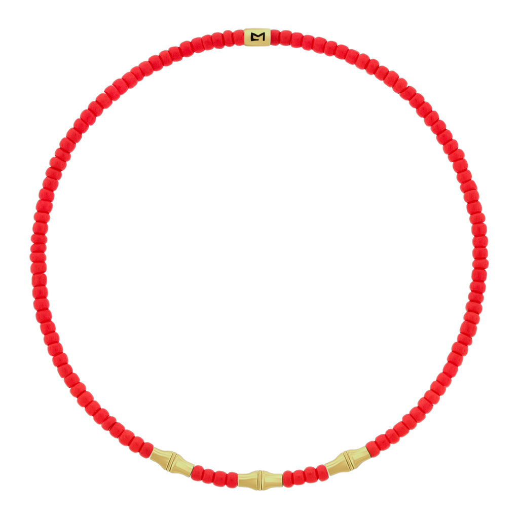 LUIS MORAIS glass beaded bracelet with three 14k yellow gold mini Canister Bamboo tubes and gold logo spacer.&nbsp;Bamboo symbolizes strength, resilience, and the ability to grow through adversity.