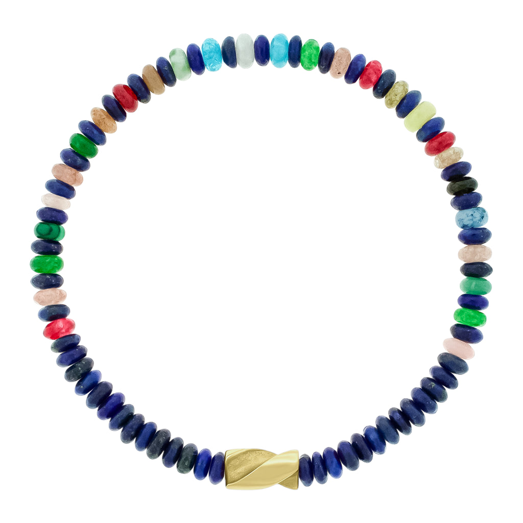 LUIS MORAIS 14k yellow gold short drill bit on a gemstone beaded bracelet. The drill bit design is symbolic of digging deeper into oneself and life’s challenges. It represents resilience and the pursuit of discovery, encouraging the wearer to push through obstacles and uncover hidden truths.