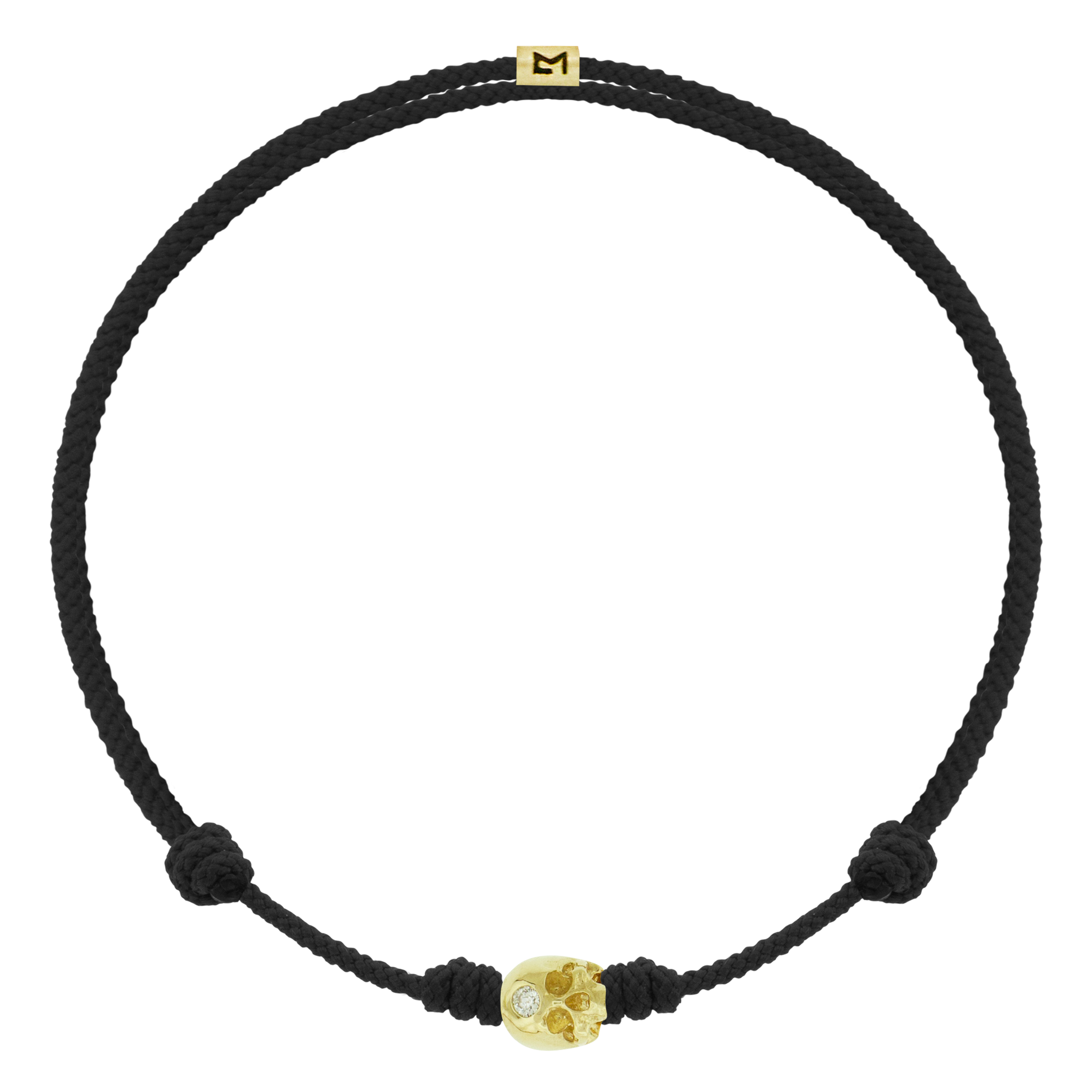 LUIS MORAIS 14k yellow gold half-skull with a white diamond on an adjustable cord bracelet. The skull is adorned with a stone on the forehead, representing the Third Eye Chakra, which symbolizes intuition and spiritual insight.